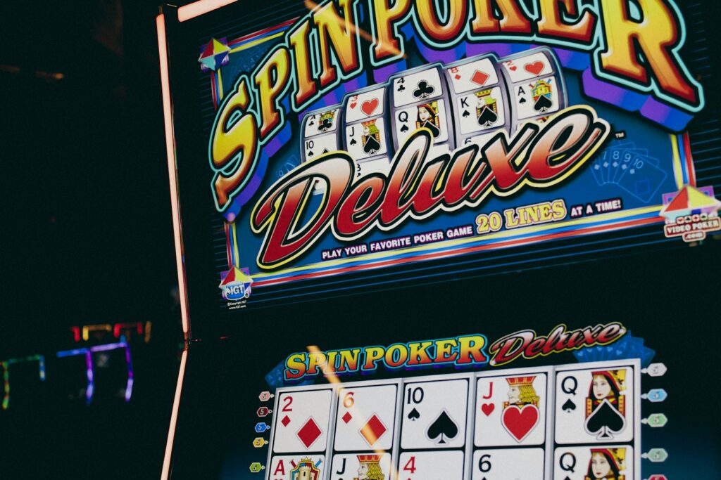 A casino machine with a slot machine next to it