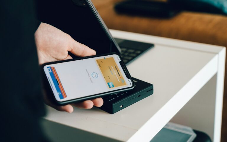 A phone paying with Google Pay.